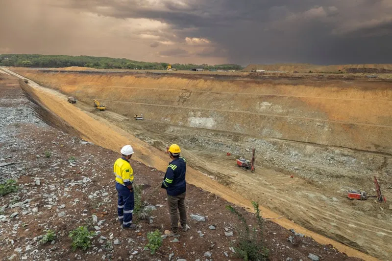 Surveyors setting out on a bench at Bulyanhulu