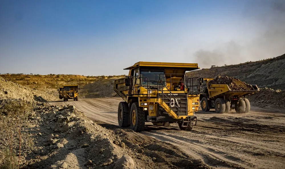 A rigid dump truck on a waste dump